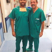 Student shadowing with doctor Student and doctor in scrubs